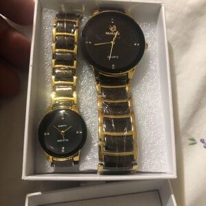 Gold and Black Two-Tone Watches with Large Dials